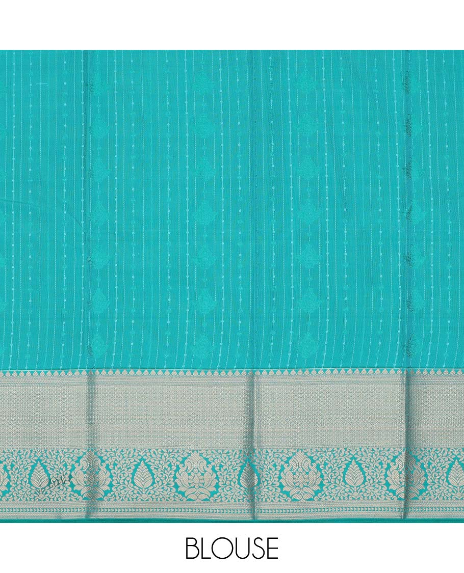 Turquoise art silk pavadai material, zari design with embossed contrast traditional zari border skirt, and contrast blouse