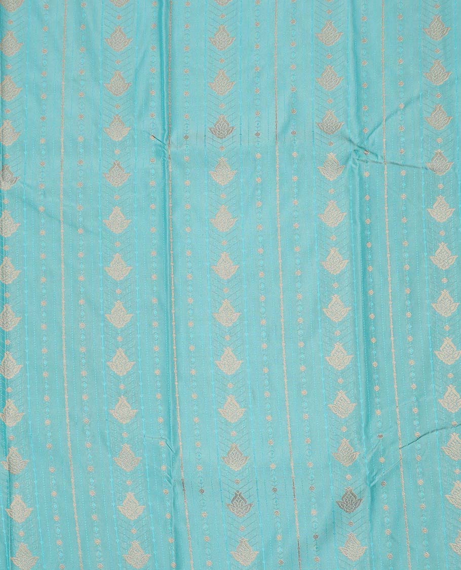 Turquoise art silk pavadai material, zari design with embossed contrast traditional zari border skirt, and contrast blouse