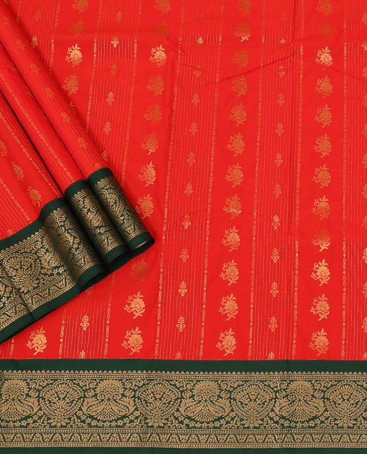 Red Art Silk Pavadai Material Set Elevated with Zari Designs All Over the Skirt, Complemented by a Contrast Floral-Paisley Zari Woven Border, and Paired with a Contrast Blouse