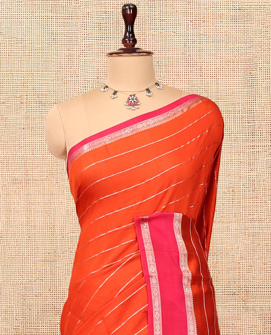 Orange Assam Silk Saree, Dazzled with Zari Stripes, Complemented Contrast by a Traditional Zari Border, Striped Pallu, and a Contrast Blouse