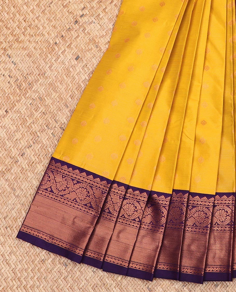 Yellow zari buttas and striped gift saree, contrast traditional zari border, and jaal pallu