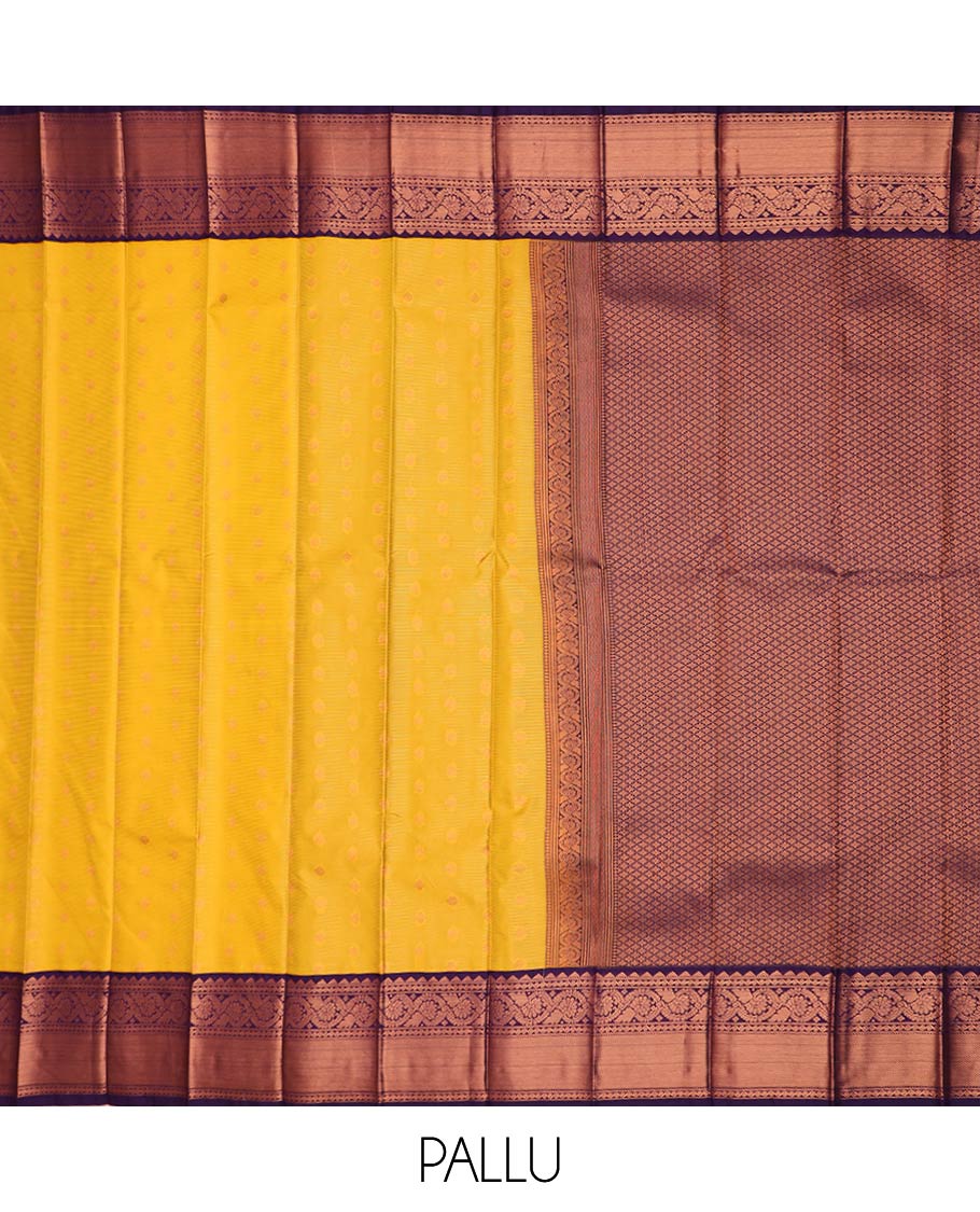 Yellow zari buttas and striped gift saree, contrast traditional zari border, and jaal pallu