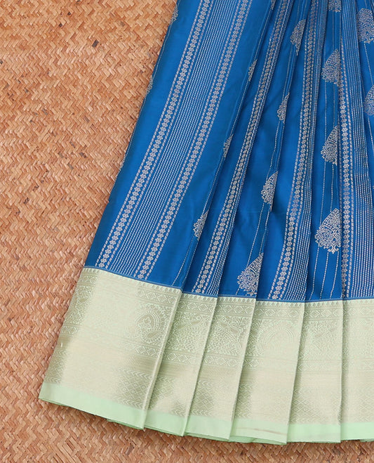 Blue geometric patterned budget silk saree, contrast traditional zari border, and pallu