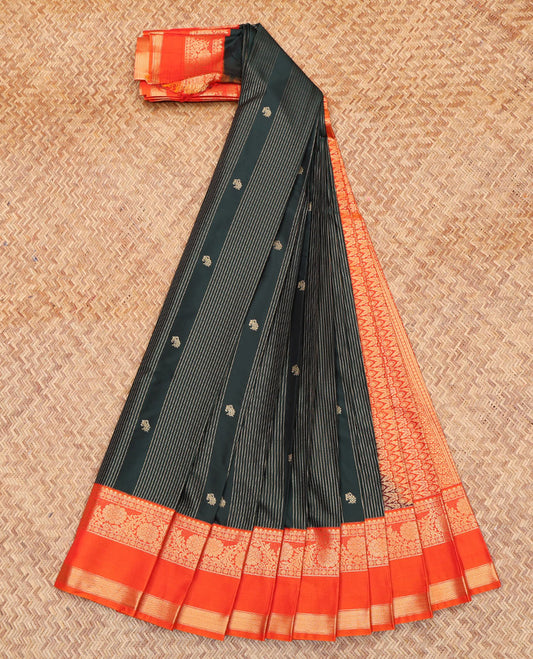 Green Budget Silk Saree, Enthralled with Zari Buttas and Stripes All Over Its Body, Complemented by a Contrast Traditional Zari  Border of Floral Creeper Designs, Intricate Pallu, and Paired with a Contrast Blouse
