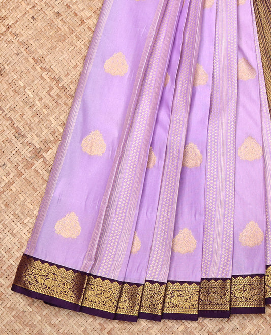 Lavender Budget Silk Saree, Gracefully Embellished with Zari Designs All Over Its Body, Complemented by a Contrast Traditional Zari Design Border, Geometric Patterned Pallu, and Paired with a Contrast Blouse