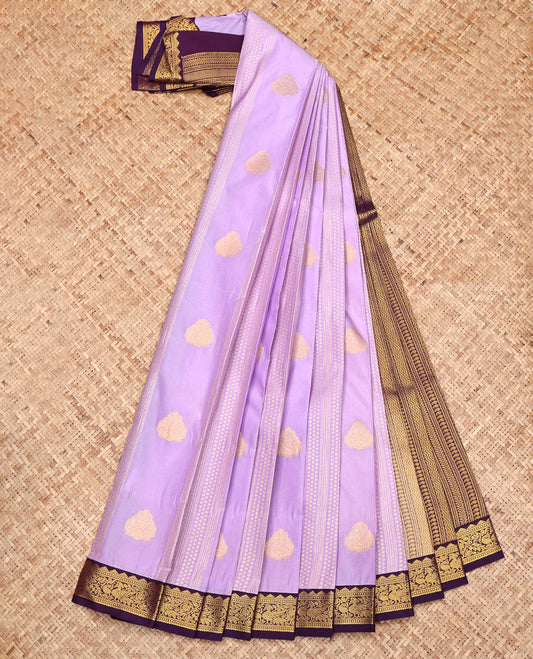 Lavender Budget Silk Saree, Gracefully Embellished with Zari Designs All Over Its Body, Complemented by a Contrast Traditional Zari Design Border, Geometric Patterned Pallu, and Paired with a Contrast Blouse