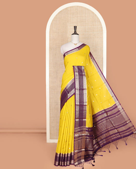 Yellow peacock buttas assam silk saree, contrast traditional zari border, and pallu of zari design