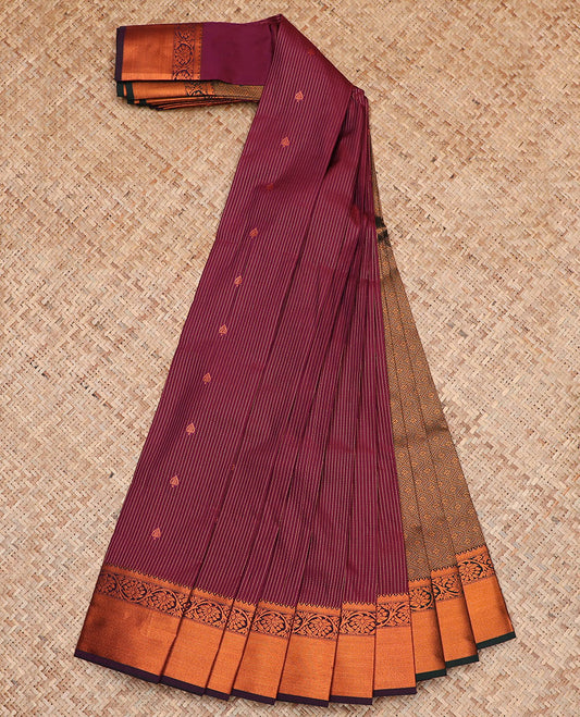 Maroon Budget Silk Saree Adorned with Dotted Zari Stripes and Zari Buttas, Complemented by a Contrasting Temple Floral Creeper Design Zari Border, Intricately Woven Jaal Pallu, and a Contrasting Zari-Bordered Blouse