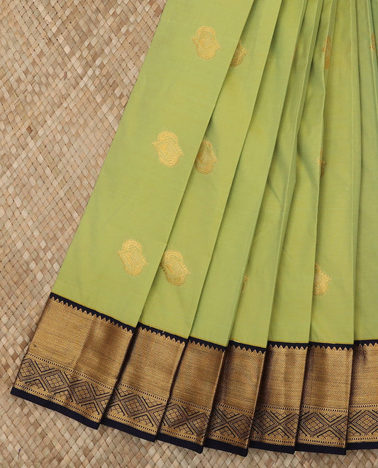 Green Budget Silk Saree Enthralled with Zari Buttas, Complemented with a Contrast Traditional Zari Design Border, Gleaming Jaal Pallu, and Paired with a Contrast Blouse