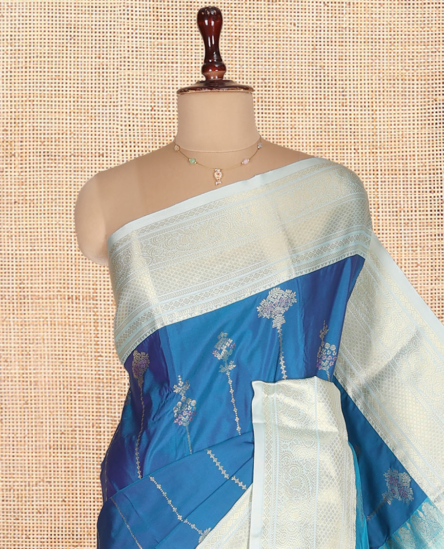 Blue Budget Silk Saree, Steeped in Richness of Zari Buttas on Its Body, Complemented by a Contrast Traditional Zari Design Border, Intricately Designed Pallu, and Paired with a Contrast Blouse