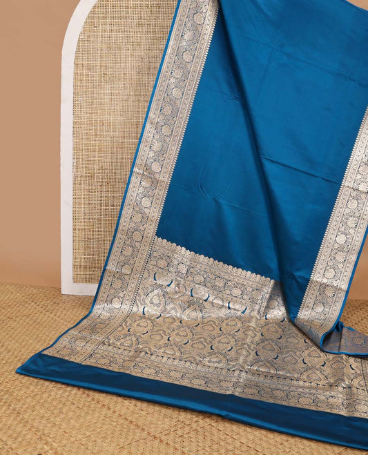 Blue semi banaras nylon saree with self floral design border & floral ogee design pallu