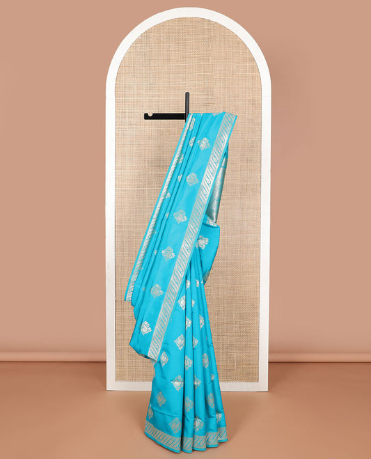 Light blue floral motifs butter silk silk saree with self zari design border & floral zari design pallu
