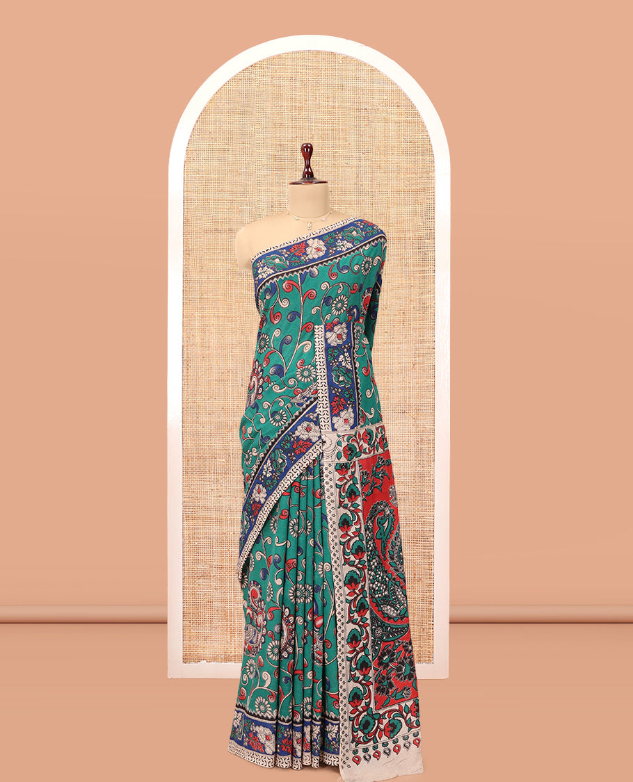 Blue Kalamkari Cotton Saree, Adorned with Floral Vine Print, Contrast Printed Border, Kalamkari Paisley Motifs Pallu, and a Contrast Blouse