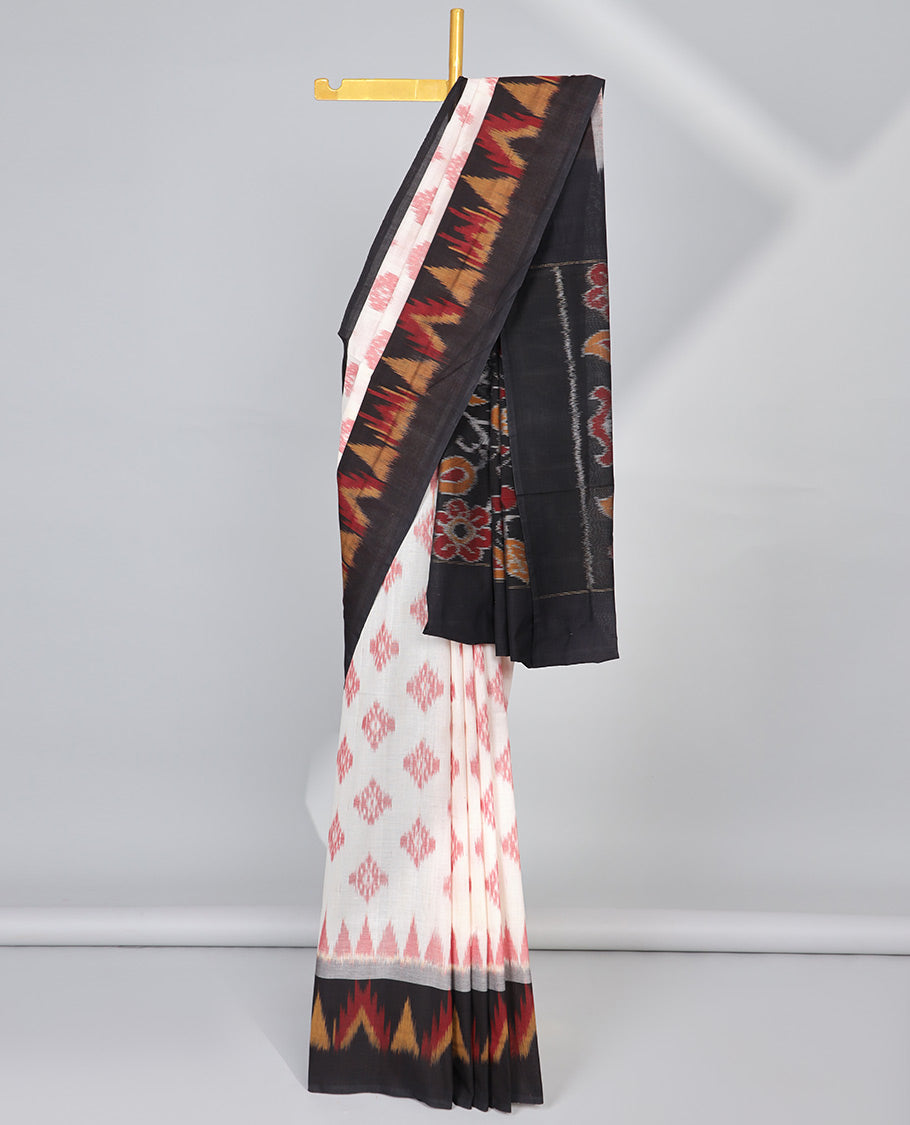 cream geometric design ikkat cotton saree with contrast triangle design border & floral vine design