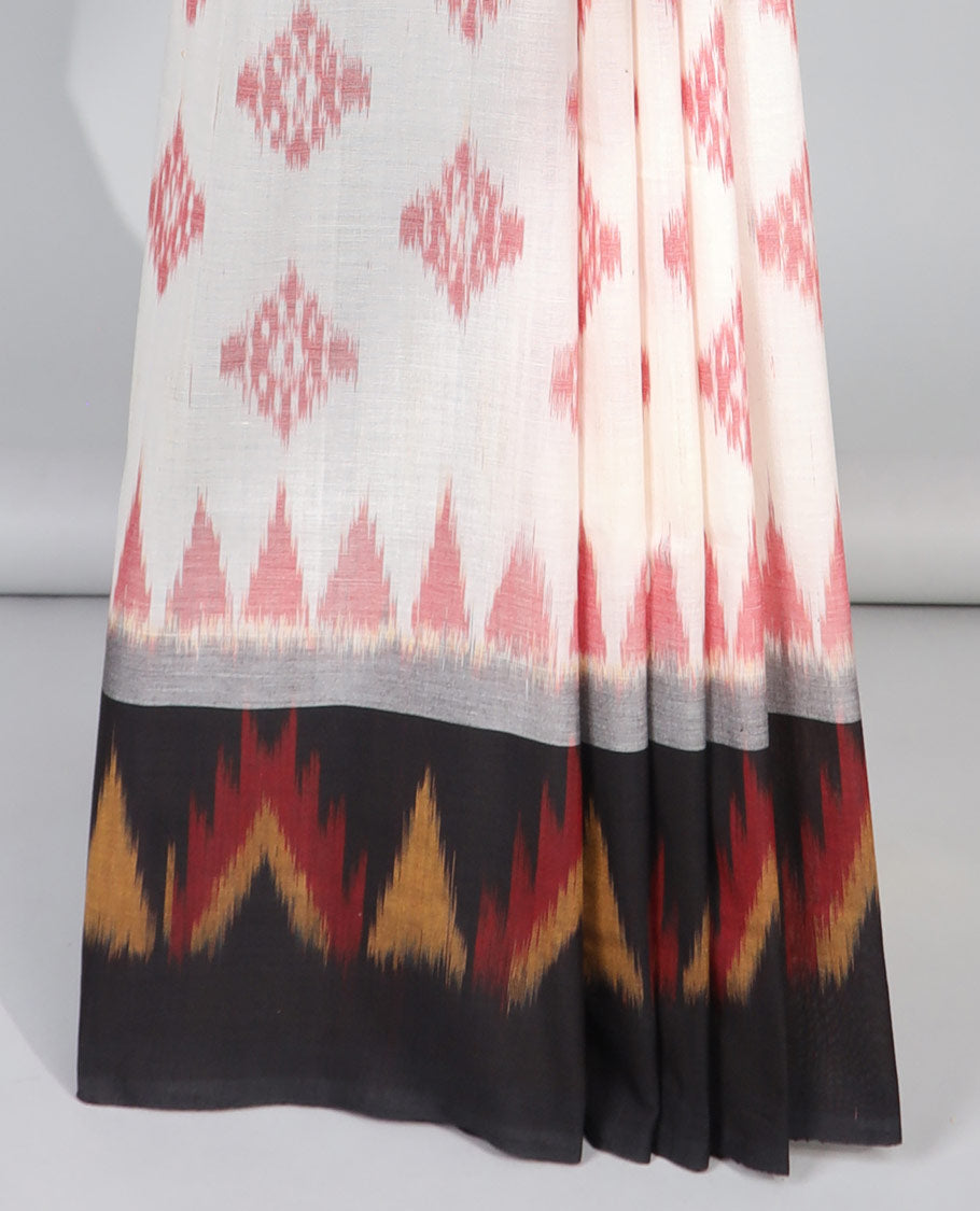 cream geometric design ikkat cotton saree with contrast triangle design border & floral vine design