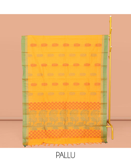 Yellow Chettinad Cotton Saree, Embellished with Buttas All Over Its Body, Complemented by a Contrast Border, Pallu of Paisleys and Checks, and Paired with a Matching Blouse