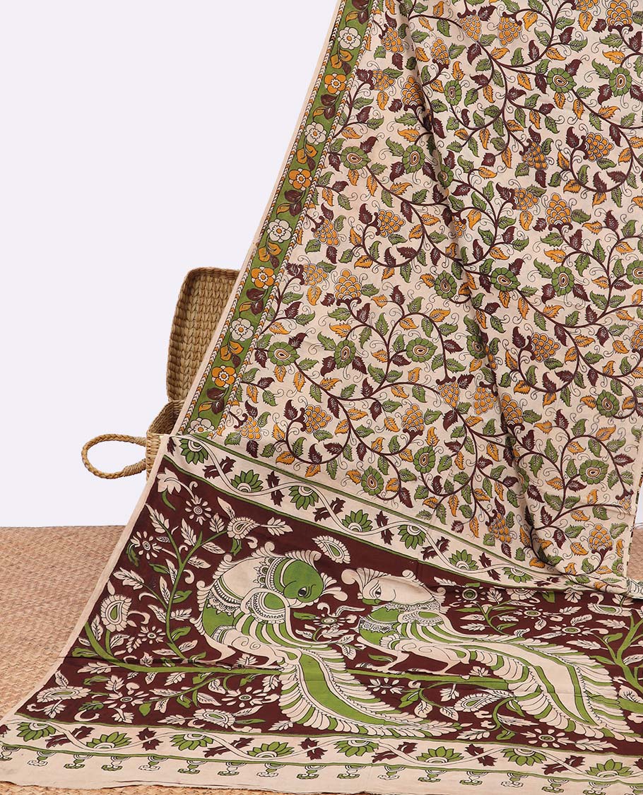 Cream floral vine design machine printed kalamkari cotton saree with contrast floral border & peacock pallu design