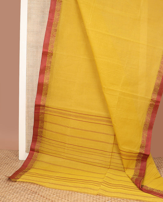 Yellow plain Bengal cotton saree, contrast floral creeper border, and striped pallu
