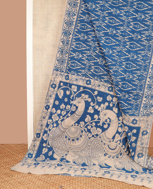 Blue ikkat design machine-printed kalamkari cotton saree, floral creeper borde, and pallu of peacock print