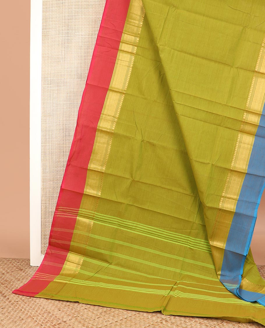Green plain Chettinad cotton saree, contrast ganga jamuna traditional zari border, and striped pallu