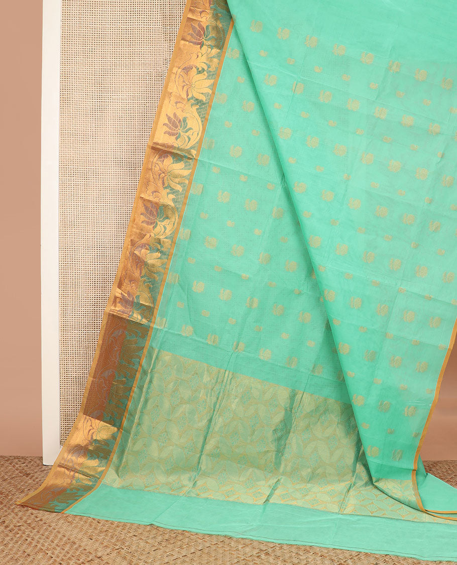Turquoise zari buttas Venkatagiri cotton saree, contrast zari floral creeper border, and pallu of leaf designs