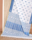 White and royal blue motifs printed linen cotton saree, contrast temple geometric patterns printed border, and pallu of human doll and geometric print