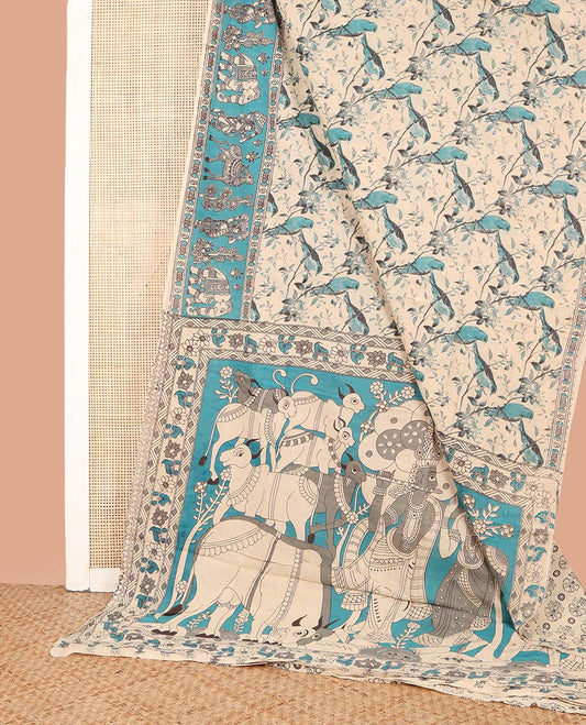 Light Sandal and Blue Machine-Printed Kalamkari Cotton Saree, Enlivened with Leaf and Bird Printed on Its Body, Contrast-Printed Border, Pallu of Pichwai Cow and Lord Krishna Print, and Paired with a Printed Blouse