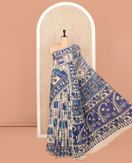 Blue Kalamkari Cotton Saree, Enriched with Warli Motifs Print, Self-Border of Musical Band, Pallu of Musical Instruments, and a Matching Blouse