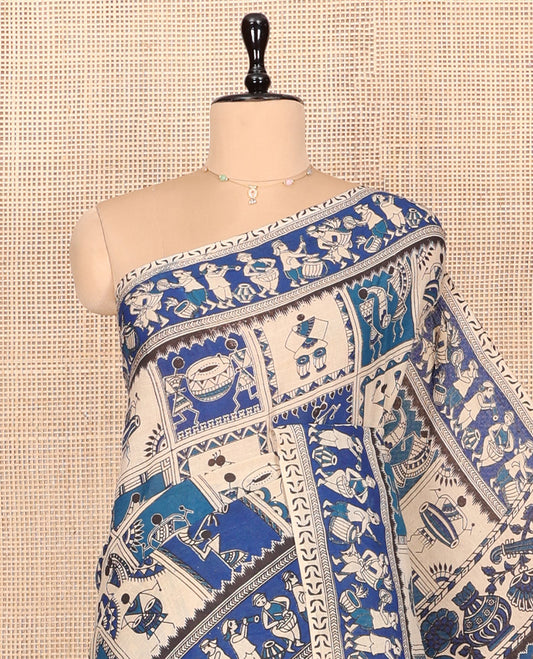 Blue Kalamkari Cotton Saree, Enriched with Warli Motifs Print, Self-Border of Musical Band, Pallu of Musical Instruments, and a Matching Blouse