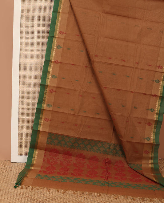 Brown kanchi cotton saree with thread buttas, contrast temple zari border & pallu of floral designs
