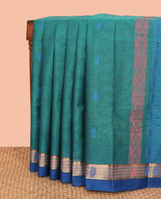 Blue Kanchi Cotton Saree, Showcasing Thread Buttas All Over Its Body, Complemented by a Contrast Border, Pallu of Jaal Designs, and Paired with a Matching Blouse