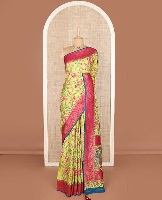 Green colorful floral vine and bird digital printed dola silk saree, contrast floral zari border, and meenakari paisleys pallu