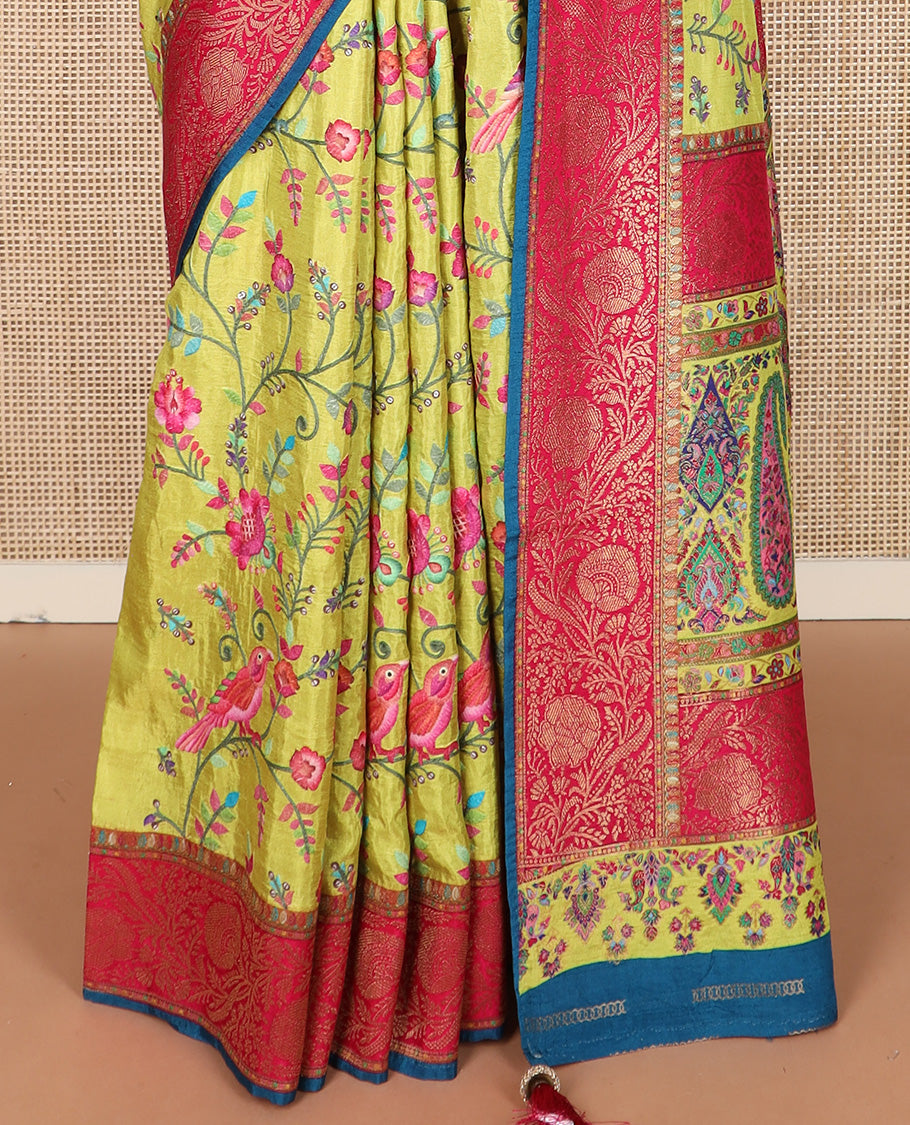 Green colorful floral vine and bird digital printed dola silk saree, contrast floral zari border, and meenakari paisleys pallu