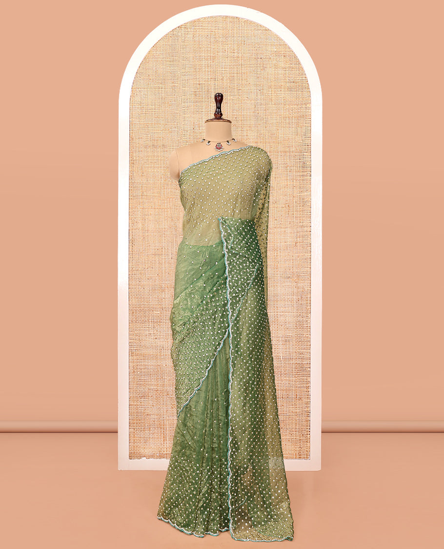 Leaf Green Organza Glass Tissue Designer Saree With Stonework, a Scallop Border, and a Matching Blouse