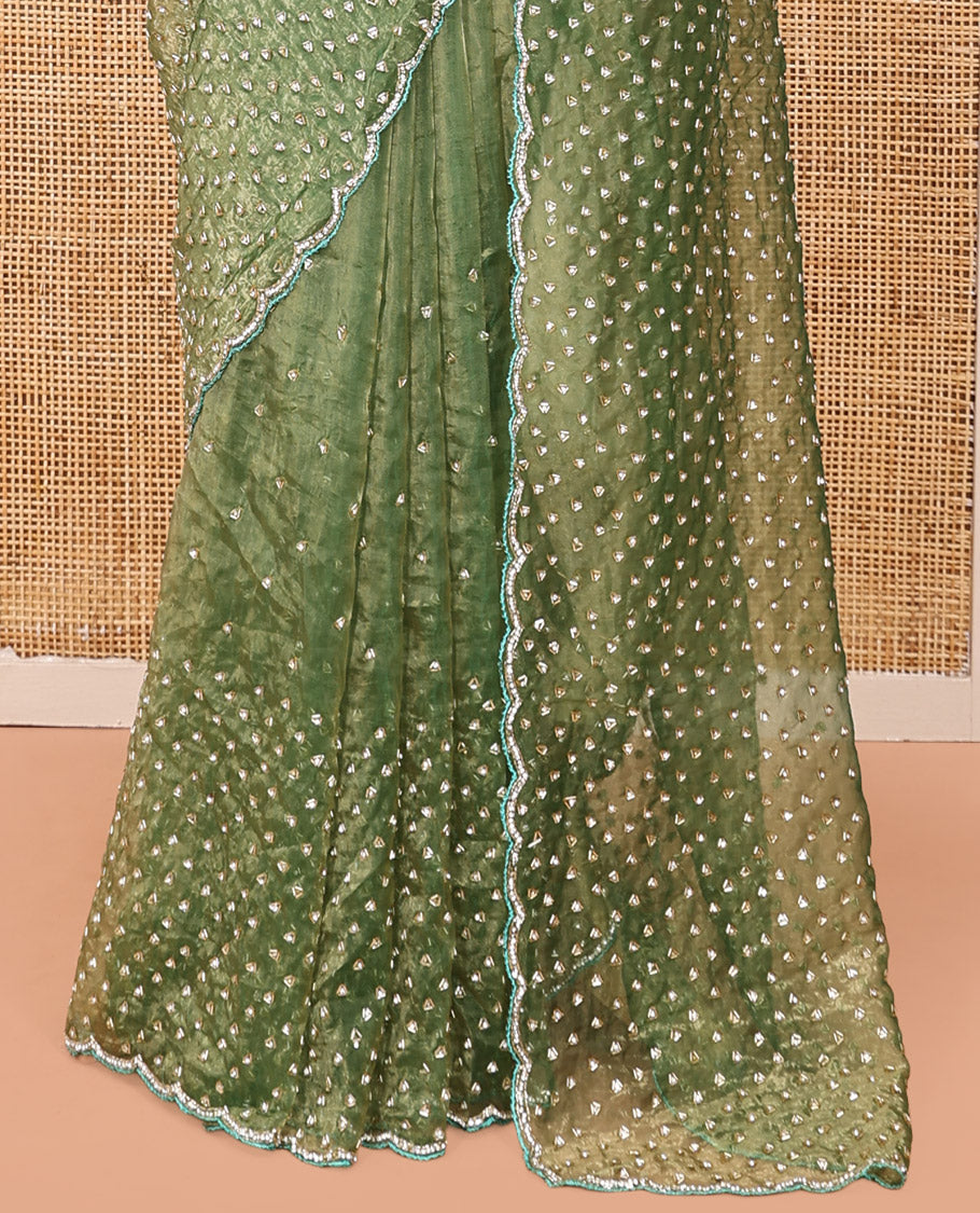 Leaf Green Organza Glass Tissue Designer Saree With Stonework, a Scallop Border, and a Matching Blouse