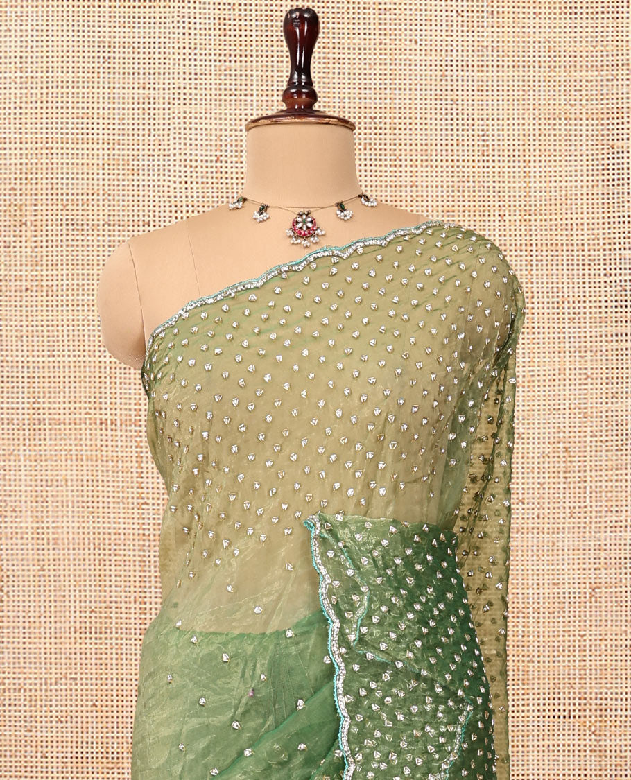 Leaf Green Organza Glass Tissue Designer Saree With Stonework, a Scallop Border, and a Matching Blouse