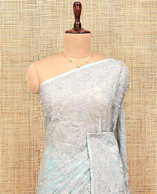 Pale Blue Designer Saree, Sparsely Detailed with Floral Vine Stone Embroidery, a Stone Embroidered Border, and a Matching Blouse