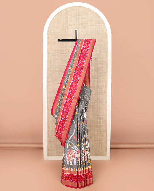 Grey Ikkat Silk Saree Decked Up with Elephant Motifs in Ikkat Weave, Complemented by a Contrast Temple Border, Pallu Woven in Intricate Ikkat Designs, and a Contrast Blouse