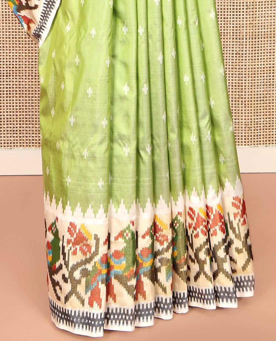 Green Pochampally Ikat Silk Saree, Steeped with Ikkat Buttas on Its Body, Complemented by a Contrast Temple Border of Paithani-Style Floral-Peacock Designs, Pallu of Same Design, and Paired with a Contrast Blouse