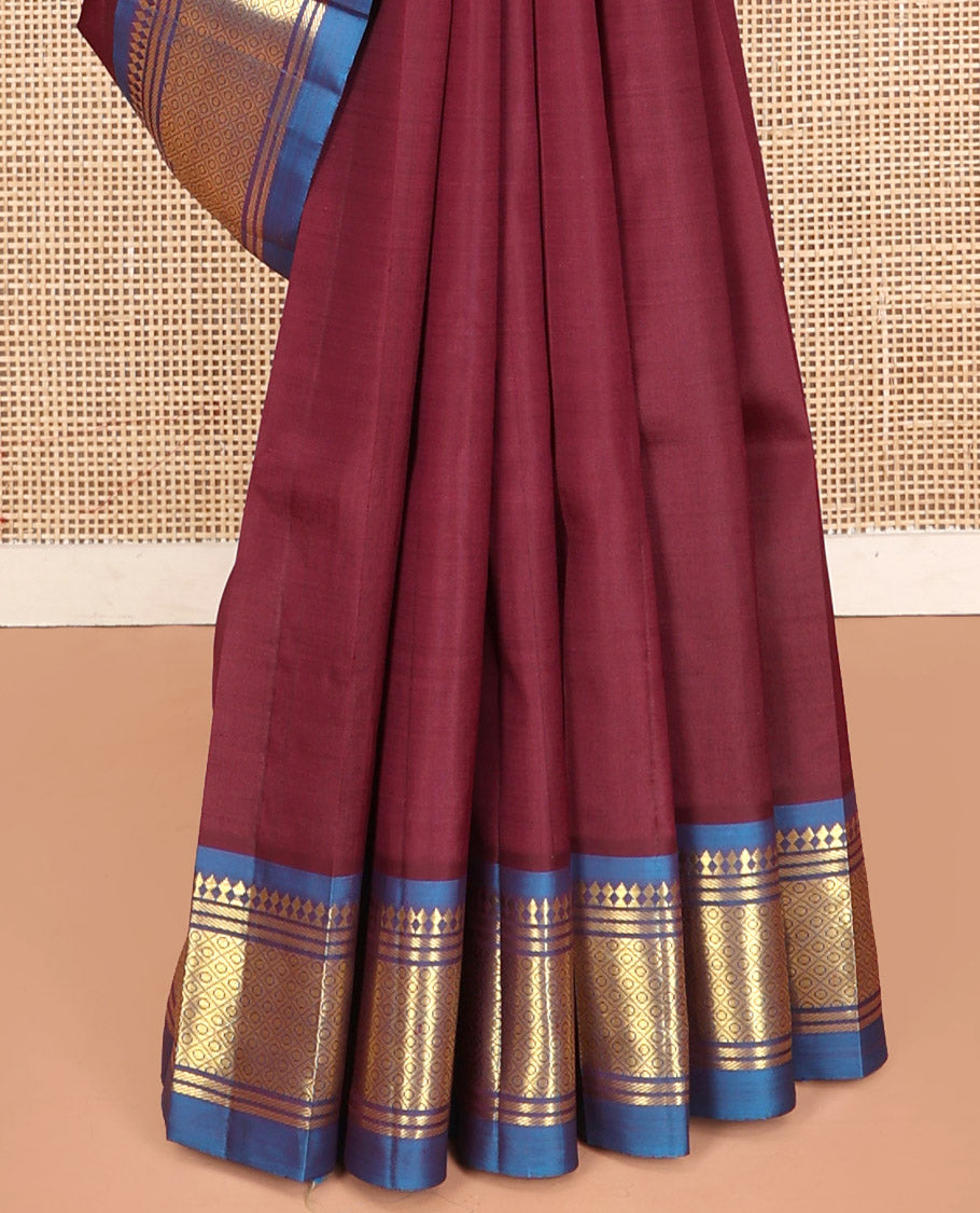 Maroon Kanchipuram Silk Saree, Decorated with Zari Buttas, Contrast Border of Paneer Sombu, Banaras, and Jaal, Pallu of Floral Creeper Design, and No Blouse