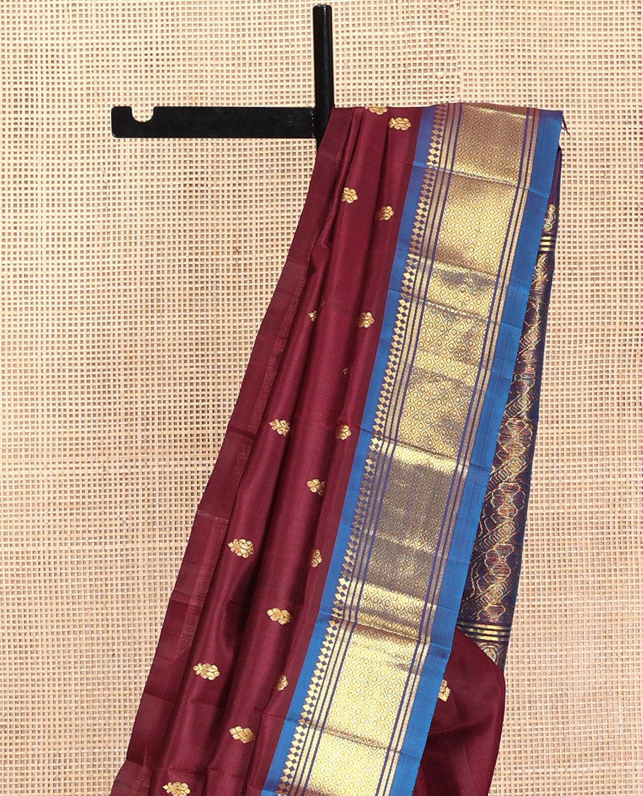 Maroon Kanchipuram Silk Saree, Decorated with Zari Buttas, Contrast Border of Paneer Sombu, Banaras, and Jaal, Pallu of Floral Creeper Design, and No Blouse