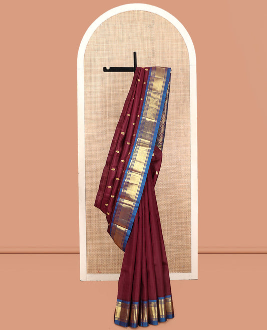 Maroon Kanchipuram Silk Saree, Decorated with Zari Buttas, Contrast Border of Paneer Sombu, Banaras, and Jaal, Pallu of Floral Creeper Design, and No Blouse
