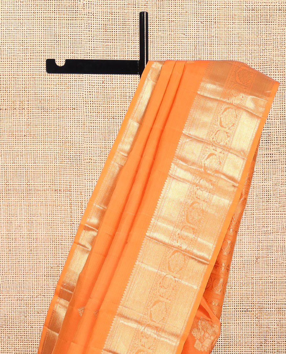 Orange Kanchipuram Silk Saree, Sparsely Woven with Zari Buttas, Highlighted by Zari Border of Thilakam Mokku, and Mayil Designs, Grand Pallu, and Matching Blouse