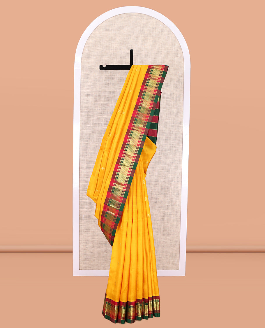 Yellow Kanchipuram Silk Saree, Woven with Zari Buttas, a Contrast One-sided Korvai Traditional Border, Pallu of Zari Designs, and No Blouse