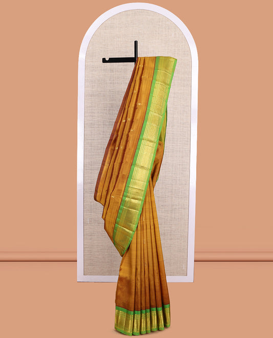 Mustard Kanchipuram Silk Saree, Elevated with Zari Buttas, a Contrast One-Sided Border of Rekku, Banaras, Muthu, and Mayil Design, Zari Design Pallu, and No Blouse