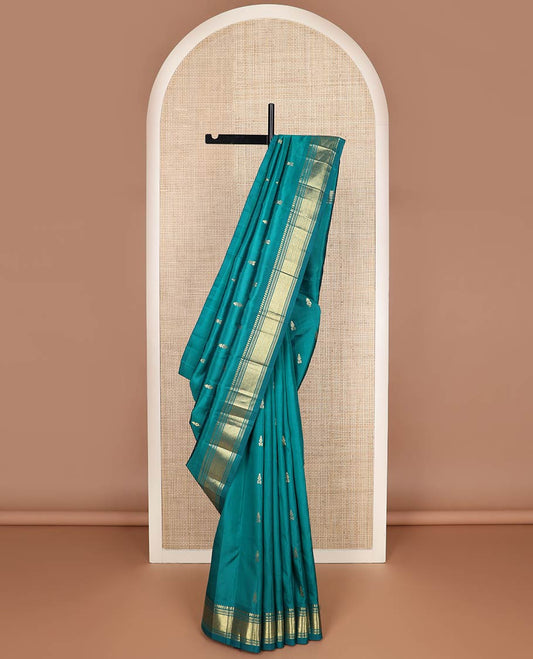 Green zari buttas kanchipuram silk saree, one-sided zari border of panner sombu,banaras,muthu & jaal & zari design pallu
