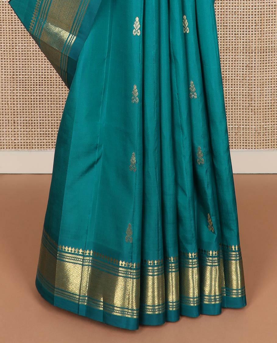 Green zari buttas kanchipuram silk saree, one-sided zari border of panner sombu,banaras,muthu & jaal & zari design pallu