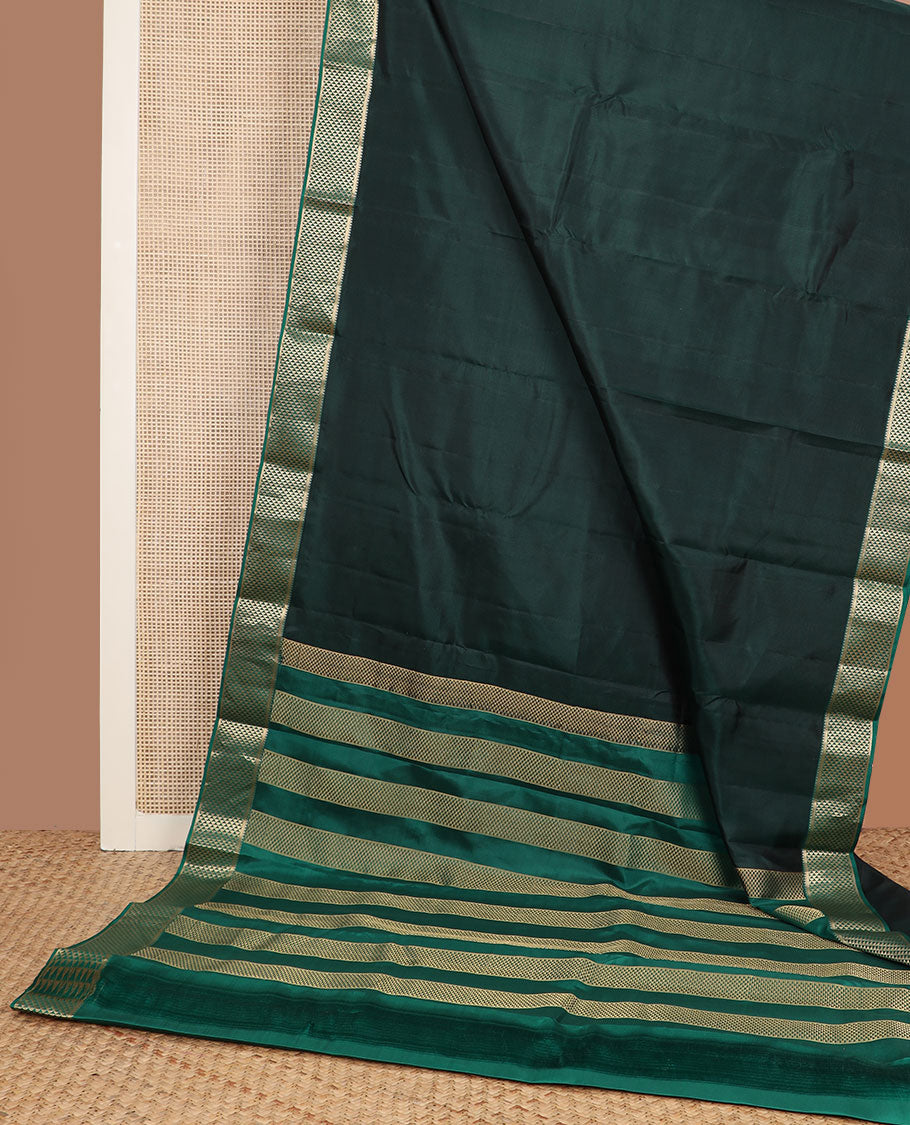 Deep forest green plain Kanchipuram silk saree, contrast border of rekku & ara maadam design & pallu of ara maadam designs