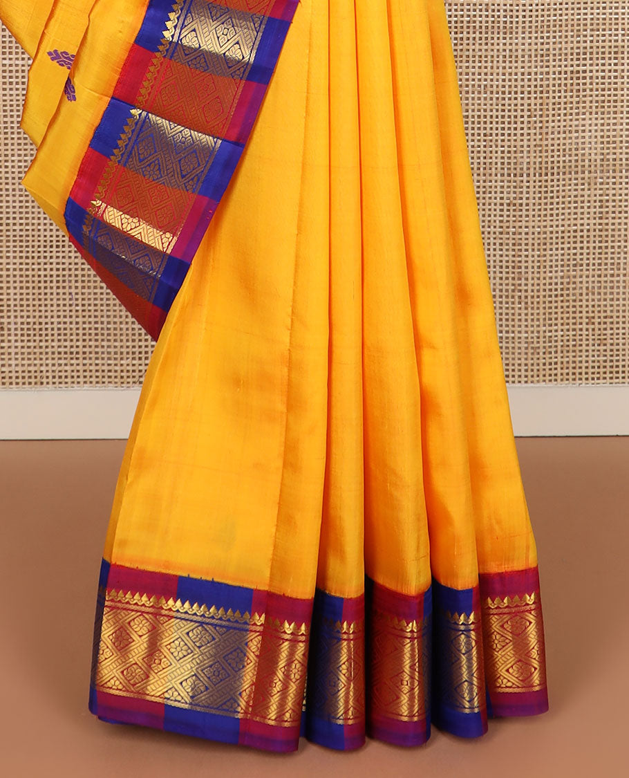 Yellow buttas Kanchipuram silk saree, contrast korvai border of thilakam mokku, banaras & jaal design & pallu of zari design