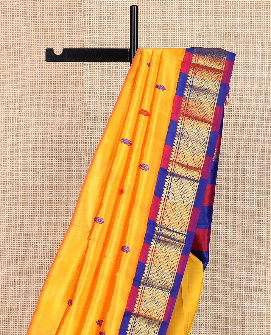 Yellow buttas Kanchipuram silk saree, contrast korvai border of thilakam mokku, banaras & jaal design & pallu of zari design